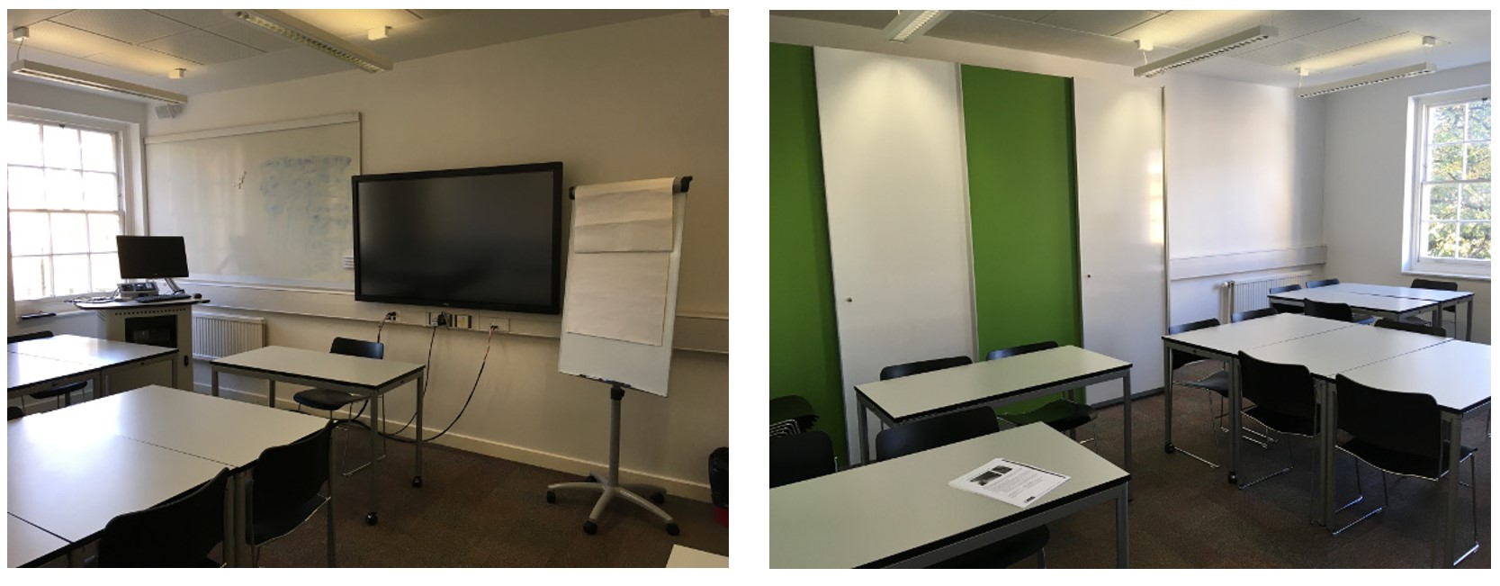 Chairs and tables in small groups around the room. The room has whiteboards fixed to the walls. The floor is carpeted.